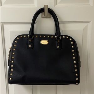 Michael kors studded black and gold bag